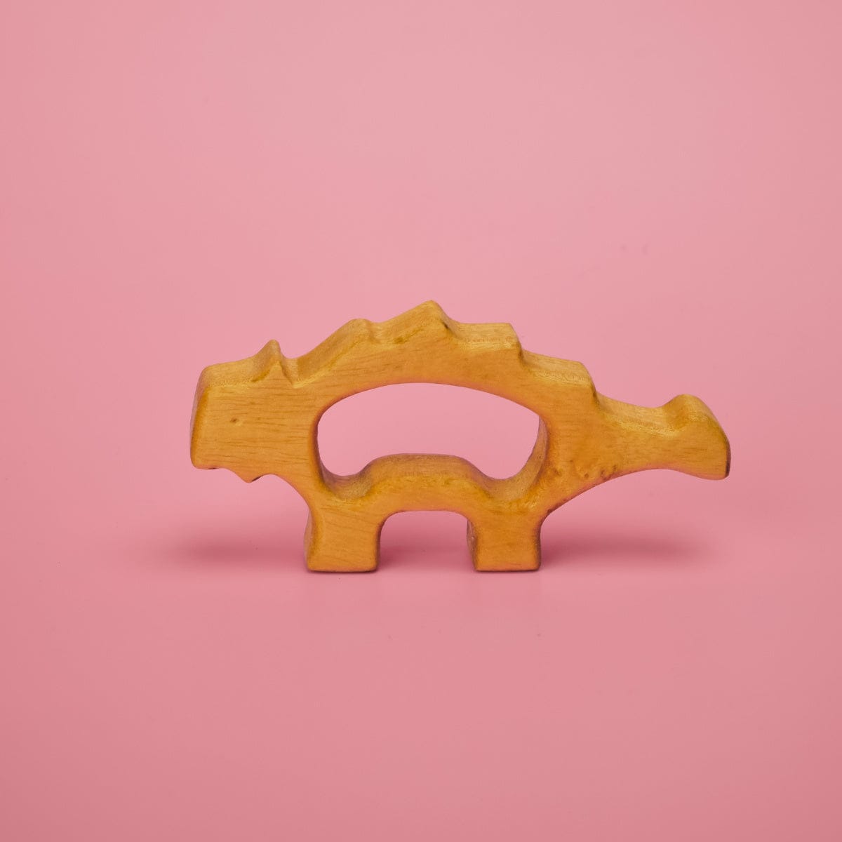 Collection of 6 wooden baby dinosaur teethers showing all dinosaur shapes available