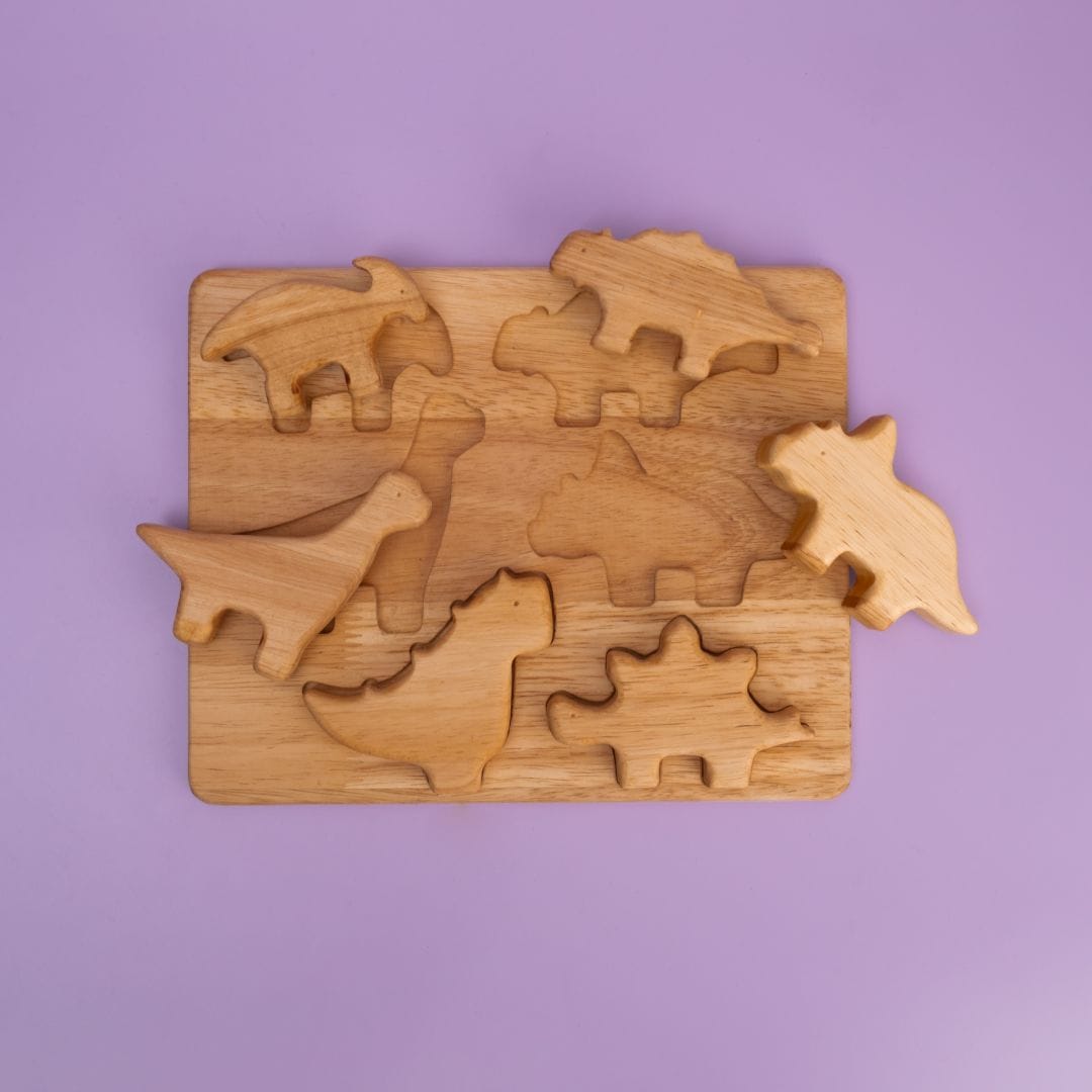 Dino Stack Mini Plus all 7 wooden dinosaur pieces removed from puzzle board