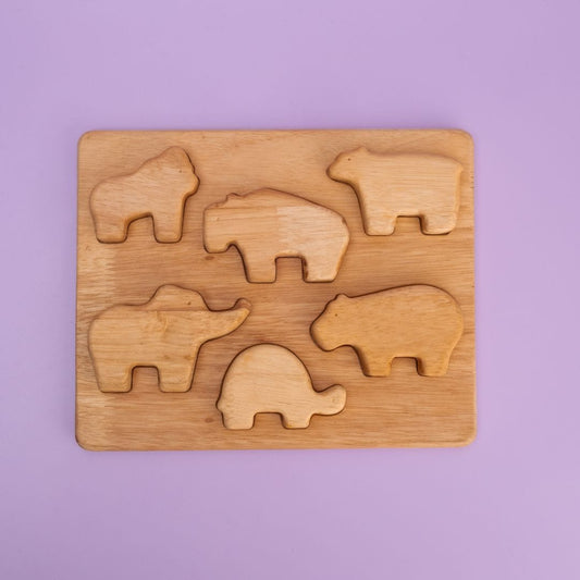 Wild Animal Stack Mini Plus wooden puzzle board with 7 wild animal shaped pieces in tray