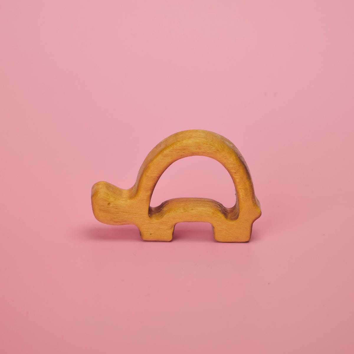 Wooden baby animal teether shaped like an elephant with smooth rounded edges for safe teething