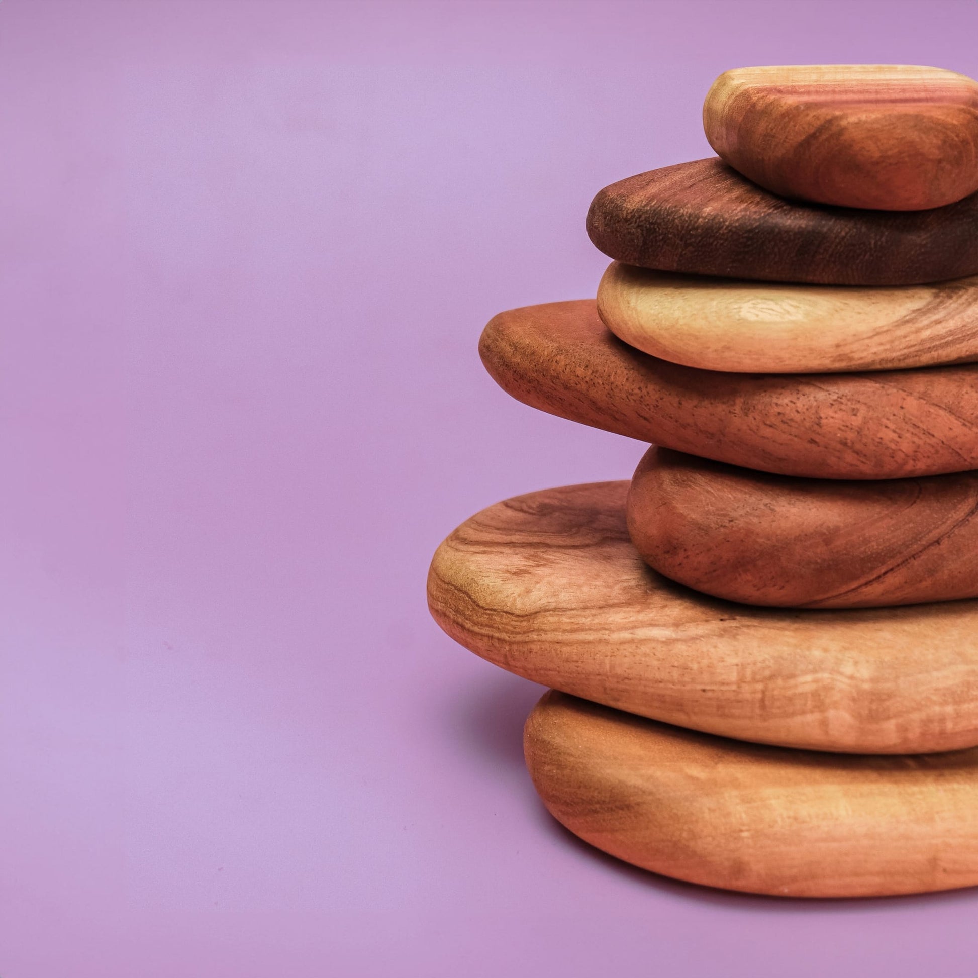 Pebble Build 7 piece wooden pebble set in eco-friendly cardboard packaging